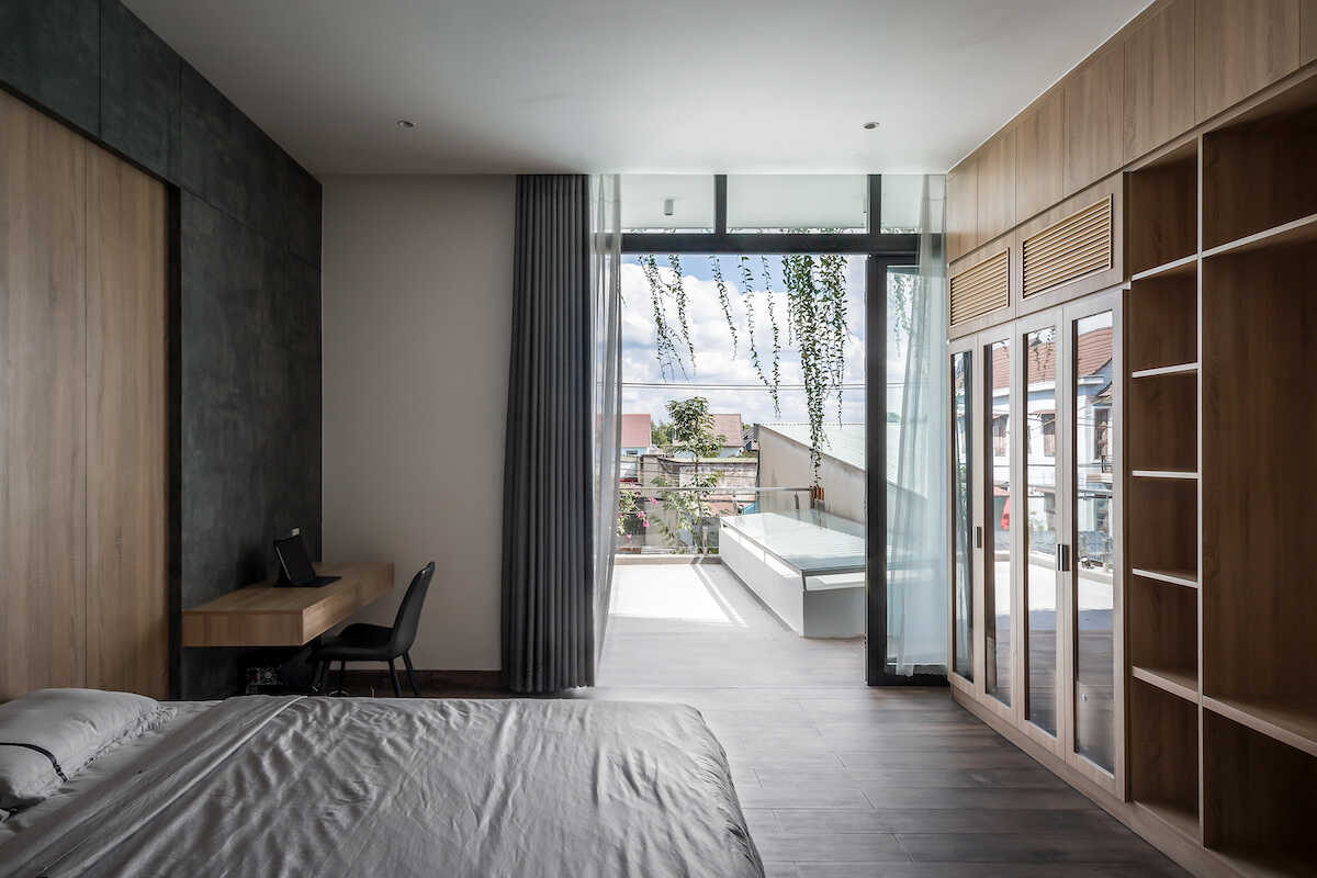 Mẫu nhà ống 3 tầng: Ấn tượng với cây cầu xanh nối liền hai khối nhà 13