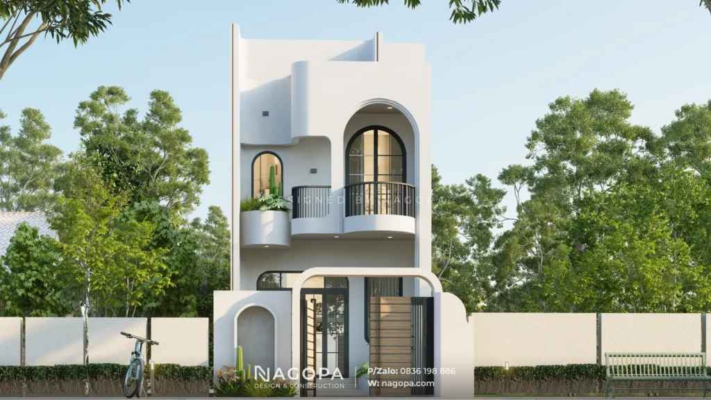 Mặt tiền nhà phố 2 tầng Vòm Cong Sắc Trắng, có khung cửa đen tương phản - Phong's House GO2565.